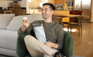customer holding his healthcare product
