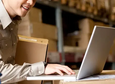 OSM's employee working on a PC to streamline operations for SFG